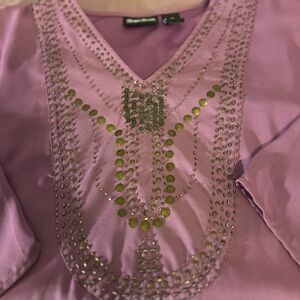 Women’s blouse with embellishments.